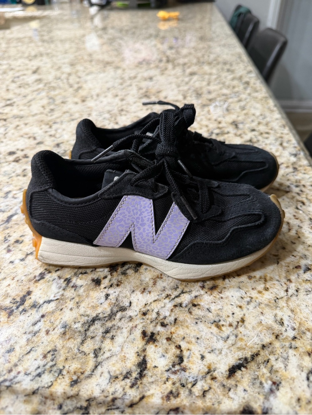 New Balance Kids Black Sneakers with Lavender 'N' Accent